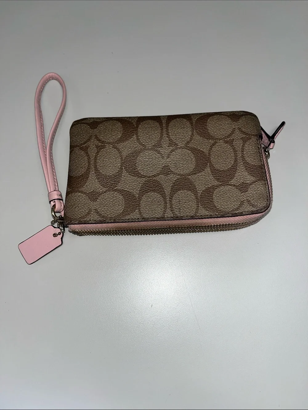 Coach Brown Signature Canvas Wristlet with Pink Trim